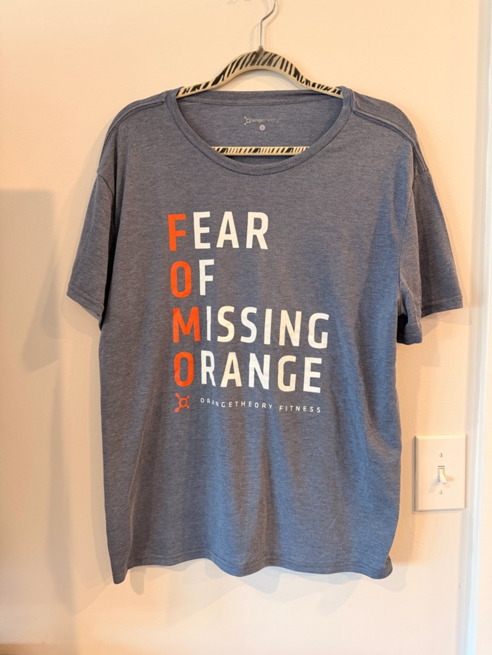 Orangetheory Blue Short Sleeve Tee with Orange & White Graphic
